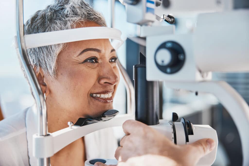 Durham / Raleigh LASIK Eye Surgery – What to Expect 1 Patient undergoing a slit lamp eye exam during a LASIK recovery follow up visit 1